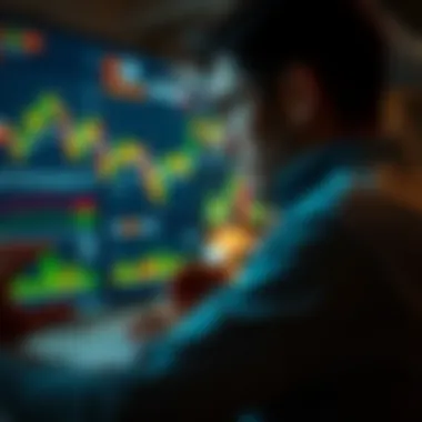 Analyzing Stock Charts A close-up of a person analyzing stock charts and graphs